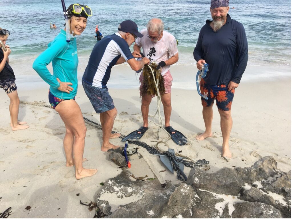 A picture containing outdoor, water, beach, person Description automatically generated